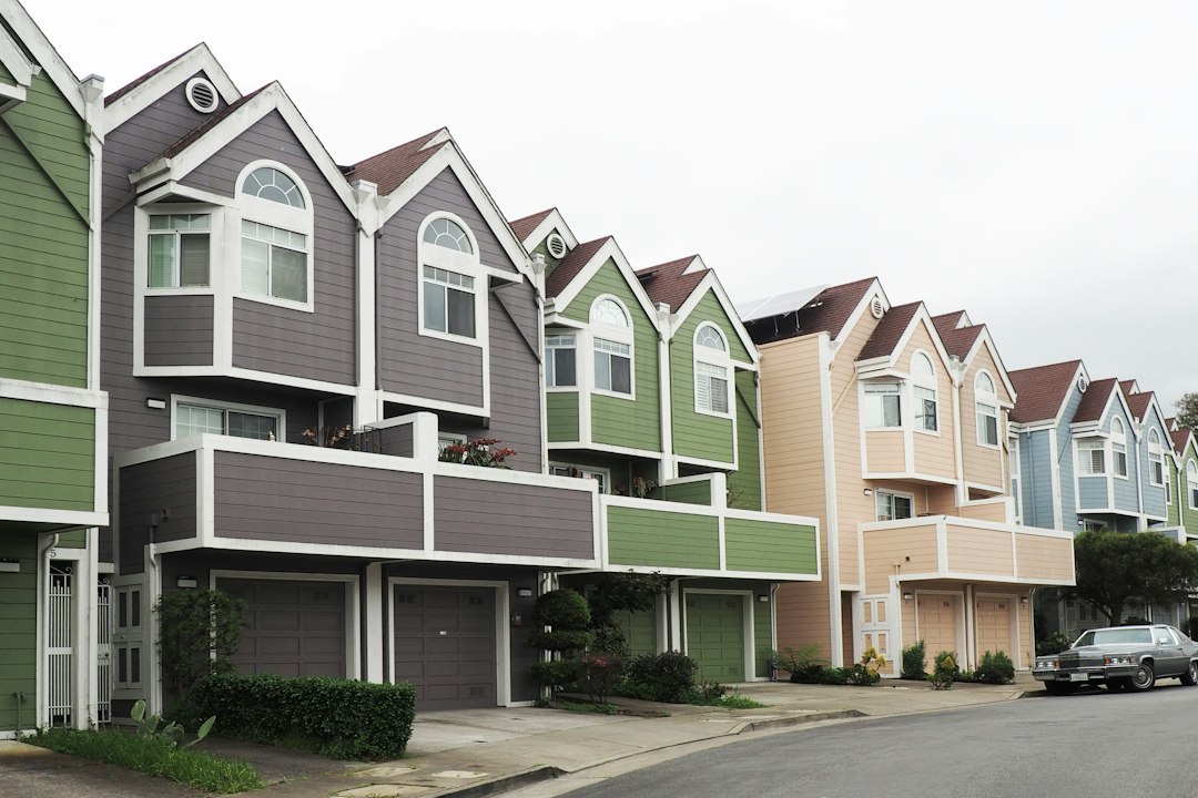 Homes along a residential street, with no people present.